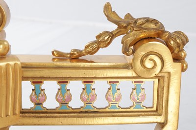 Lot 681 - A PAIR OF LATE 19TH CENTURY FRENCH ORMOLU AND CHAMPLEVE ENAMELLED FIRE DOGS