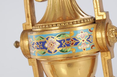 Lot 681 - A PAIR OF LATE 19TH CENTURY FRENCH ORMOLU AND CHAMPLEVE ENAMELLED FIRE DOGS