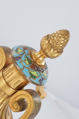Lot 681 - A PAIR OF LATE 19TH CENTURY FRENCH ORMOLU AND CHAMPLEVE ENAMELLED FIRE DOGS