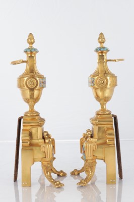 Lot 681 - A PAIR OF LATE 19TH CENTURY FRENCH ORMOLU AND CHAMPLEVE ENAMELLED FIRE DOGS