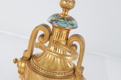Lot 681 - A PAIR OF LATE 19TH CENTURY FRENCH ORMOLU AND CHAMPLEVE ENAMELLED FIRE DOGS