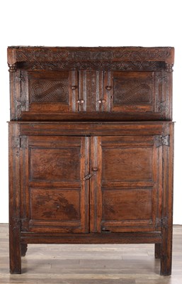 Lot 1578 - A 17TH CENTURY WESTMORLAND CARVED OAK DATED COURT CUPBOARD