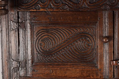 Lot 1578 - A 17TH CENTURY WESTMORLAND CARVED OAK DATED COURT CUPBOARD