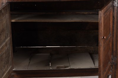 Lot 1578 - A 17TH CENTURY WESTMORLAND CARVED OAK DATED COURT CUPBOARD
