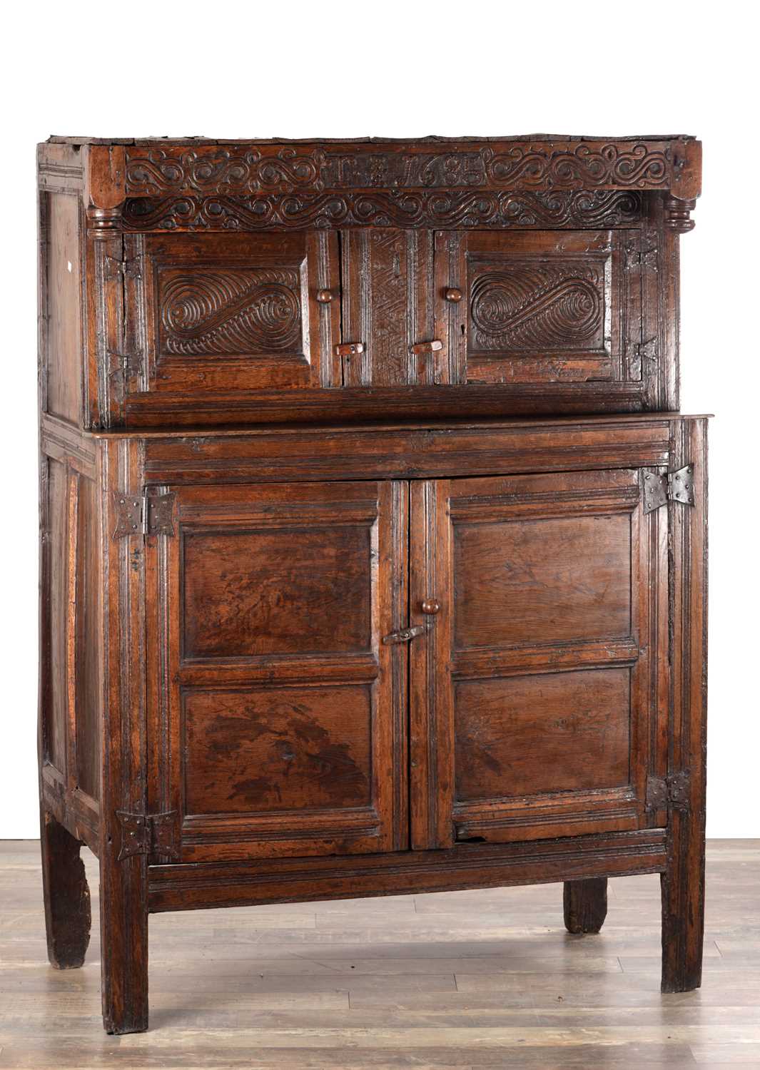 Lot 1578 - A 17TH CENTURY WESTMORLAND CARVED OAK DATED COURT CUPBOARD