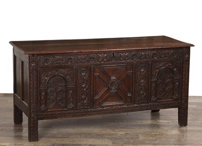Lot 1547 - A 17TH CENTURY ENGLISH OAK CARVED COFFER