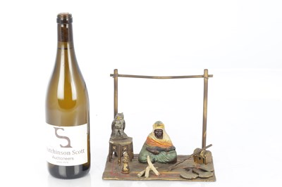 Lot 947 - IN THE MANNER OF FRANZ BERGMANN. A COLD-PAINTED BRONZED FIGURAL SCULPTURE