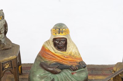 Lot 947 - IN THE MANNER OF FRANZ BERGMANN. A COLD-PAINTED BRONZED FIGURAL SCULPTURE