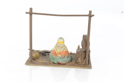 Lot 947 - IN THE MANNER OF FRANZ BERGMANN. A COLD-PAINTED BRONZED FIGURAL SCULPTURE
