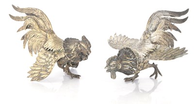 Lot 890 - A PAIR OF 20TH CENTURY SILVERED FIGHTING COCKERELS