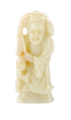 Lot 452 - AN EARLY CHINESE CARVED JADE SCULPTURE OF A STANDING FEMALE IMMORTAL