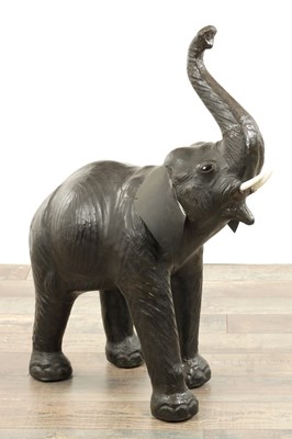 Lot 902 - A VINTAGE LEATHER BOUND SCULPTURE OF AN ELEPHANT