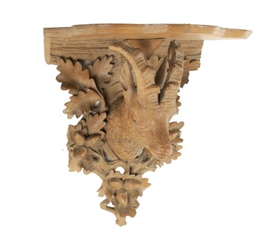 Lot 987 - A 19TH CENTURY BLACK FOREST CARVED LINDEN WOOD WALL BRACKET