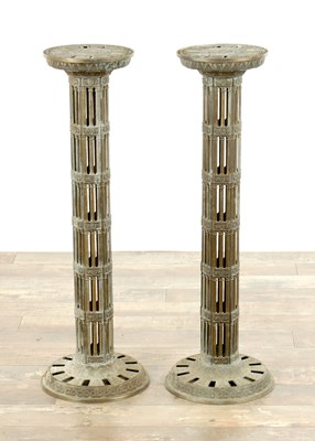Lot 748 - A PAIR OF LATE 19TH CENTURY BRASS GOTHIC STYLE TORCHIERES