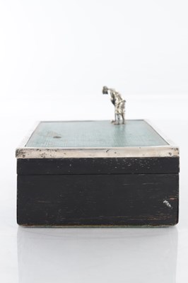 Lot 183 - A 1930’S SILVER AND EBONY VENEERED GOLFER CIGARETTE BOX