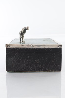 Lot 183 - A 1930’S SILVER AND EBONY VENEERED GOLFER CIGARETTE BOX