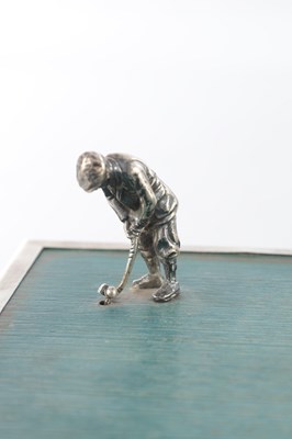 Lot 183 - A 1930’S SILVER AND EBONY VENEERED GOLFER CIGARETTE BOX