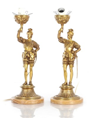 Lot 784 - A PAIR OF GILT BRASS FIGURAL TABLE LAMPS