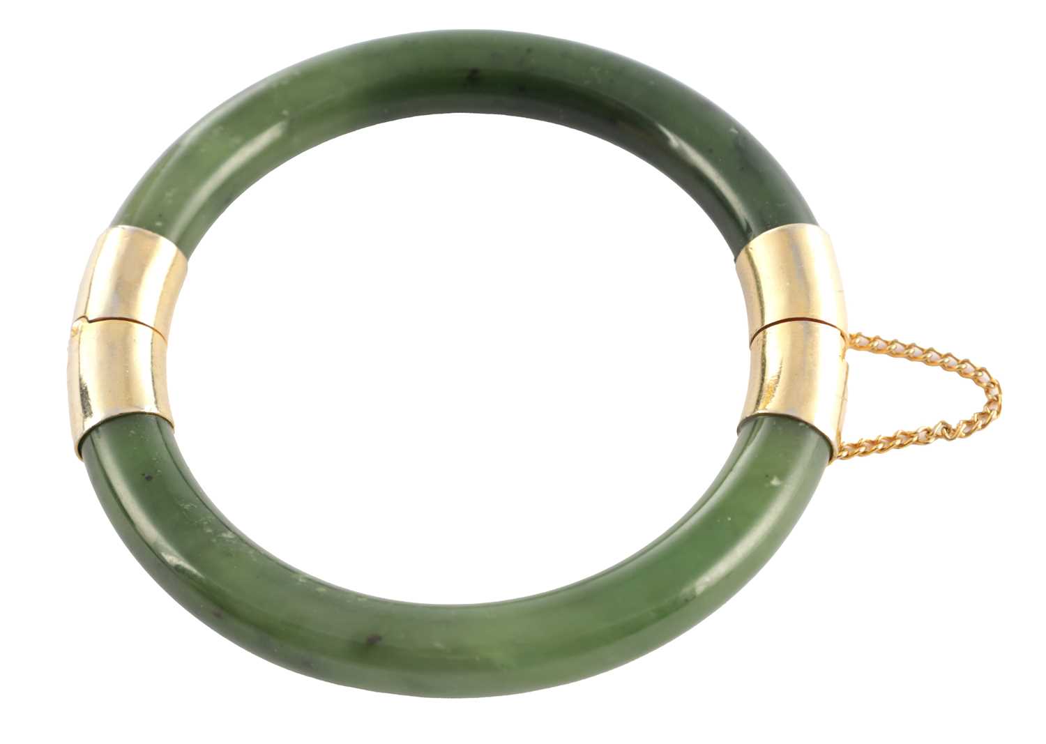 Lot 178 - AN ORIENTAL SAGE GREEN JADE AND GOLD METAL MOUNTED BANGEL