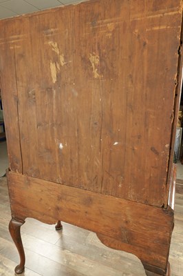 Lot 1307 - A QUEEN ANNE FIGURED WALNUT CHEST OF STAND
