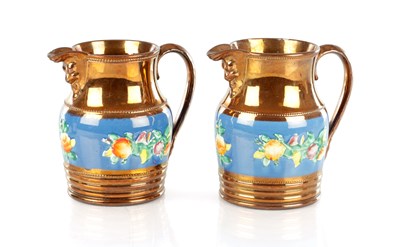 Lot 1677 - A PAIR OF 19TH CENTURY COPPER LUSTRE WARE MUGS