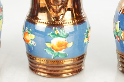 Lot 41 - A GRADUATED SET OF THREE 19TH CENTURY COPPER LUSTRE WARE MUGS