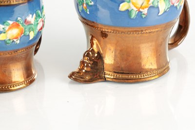 Lot 41 - A GRADUATED SET OF THREE 19TH CENTURY COPPER LUSTRE WARE MUGS
