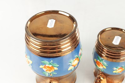 Lot 41 - A GRADUATED SET OF THREE 19TH CENTURY COPPER LUSTRE WARE MUGS