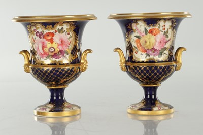 Lot 18 - A PAIR OF ROYAL DERBY CERAMIC URN SHAPED VASES