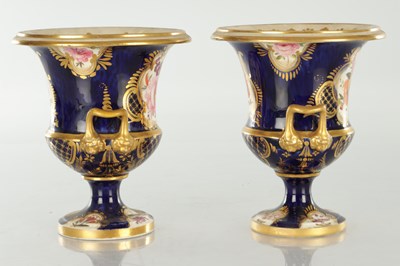 Lot 18 - A PAIR OF ROYAL DERBY CERAMIC URN SHAPED VASES