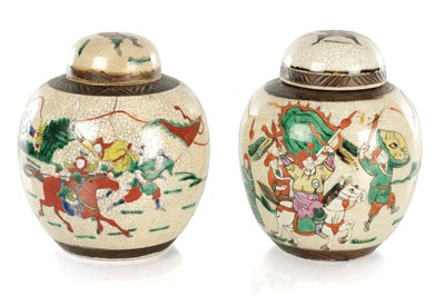Lot 1724 - A PAIR OF CHINESE CRACKLE GLAZED GINGER JARS AND COVERS