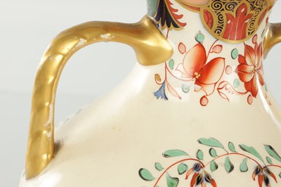 Lot 40 - A PAIR OF 19TH CENTURY COPELAND SPODE IMARI PATTERN CERAMIC ENGLISH BOTTLE VASES