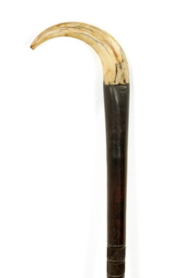 Lot 1071 - A 19TH CENTURY COLONIAL HARDWOOD AND TUSK WALKING STICK