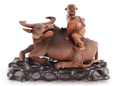 Lot 176 - A 19TH CENTURY CHINESE CARVED HARDWOOD WATER BUFFALO SCULPTURE