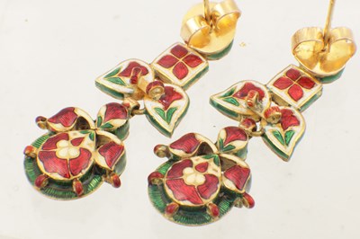 Lot 144 - A PAIR OF GOLD AND ENAMEL HAND CUT DIAMOND SET PENDANT EARRINGS