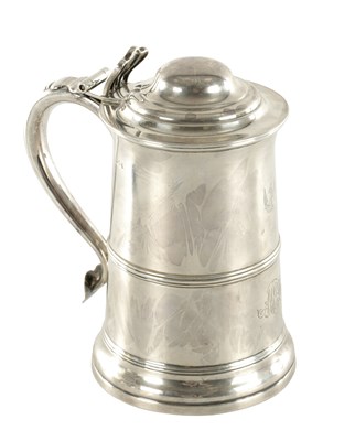 Lot 454 - A REGENCY SILVER LIDDED TANKARD