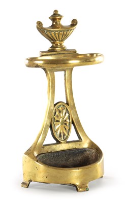 Lot 228 - A 19TH CENTURY CAST BRASS DOOR STOP FORMED AS A STICK STAND