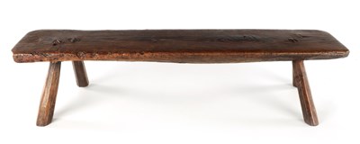 Lot 315 - A 19TH CENTURY ELM LOW STOOL