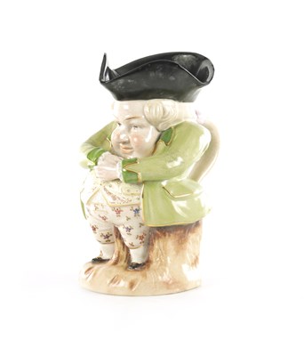 Lot 41 - AN EARLY 19TH CENTURY STAFFORDSHIRE TOBY JUG