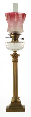 Lot 539 - A 19TH CENTURY BRASS CORINTHIAN COLUMN OIL LAMP