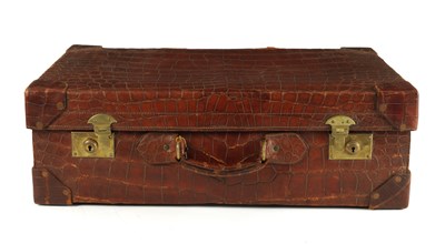 Lot 658 - A CROCODILE SKIN SUITCASE CIRCA 1900