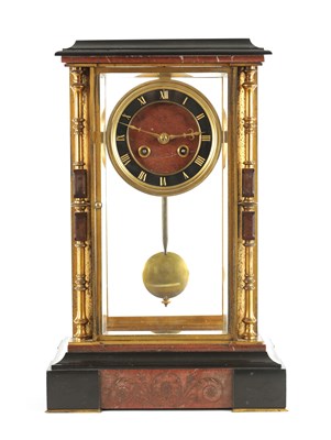 Lot 1024 - A LATE 19TH CENTURY FRENCH ORMOLU, BLACK AND ROUGE MARBLE MANTEL CLOCK