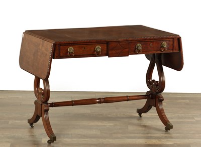 Lot 1552 - A REGENCY MAHOGANY SOFA TABLE WITH EBONY INLAID DECORATION