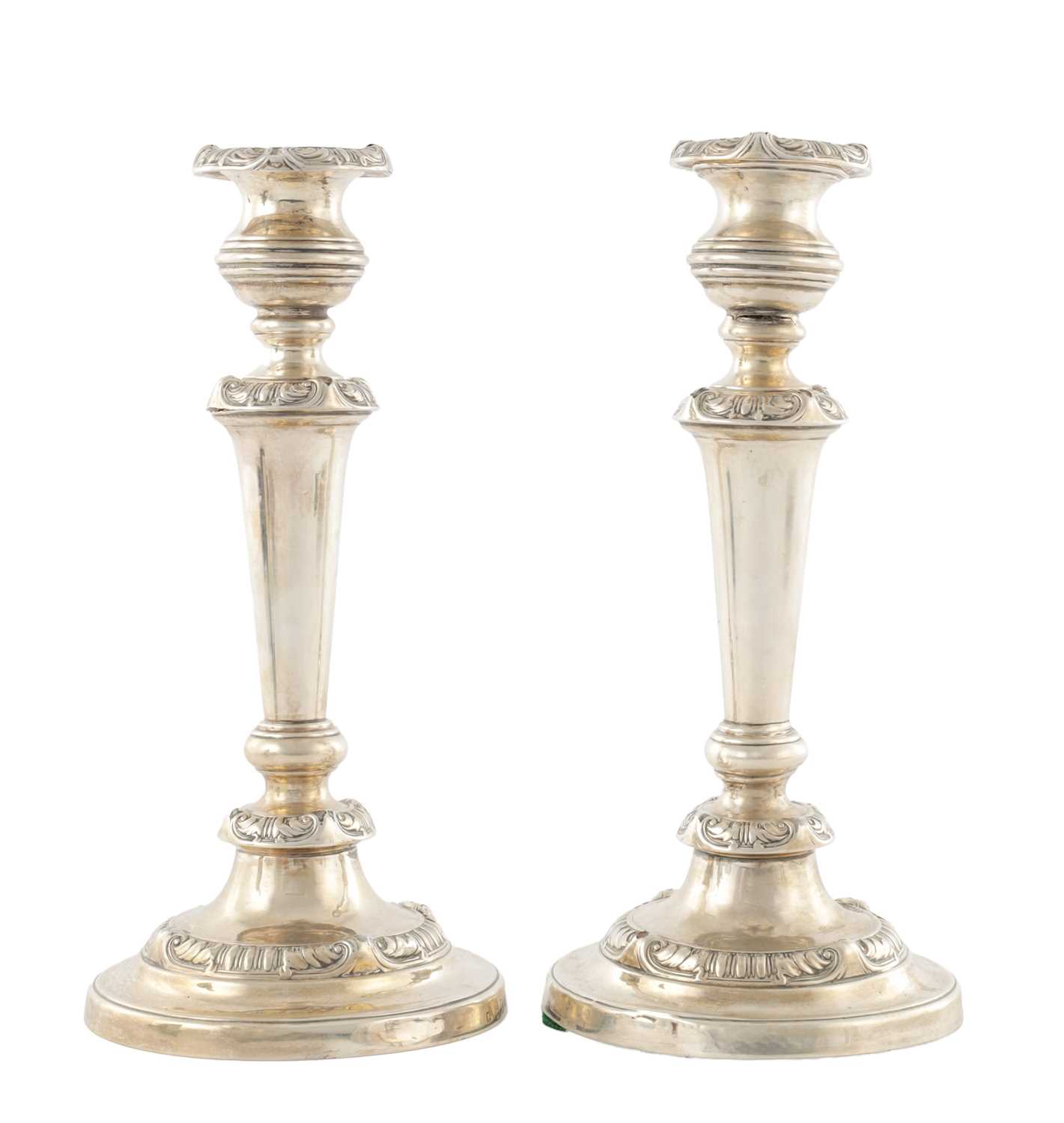 Lot 142 - A PAIR OF REGENCY SILVER CANDLESTICKS