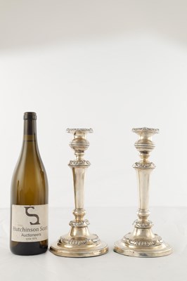 Lot 142 - A PAIR OF REGENCY SILVER CANDLESTICKS