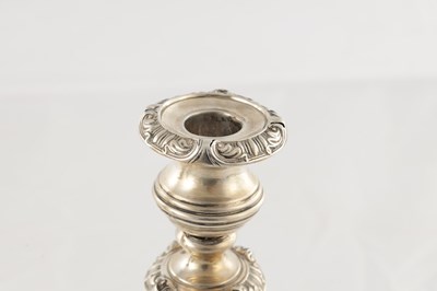 Lot 142 - A PAIR OF REGENCY SILVER CANDLESTICKS