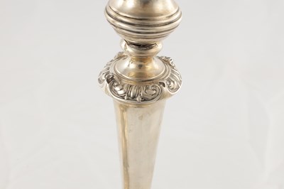 Lot 142 - A PAIR OF REGENCY SILVER CANDLESTICKS