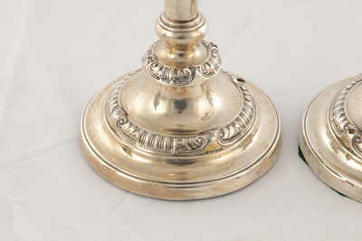 Lot 142 - A PAIR OF REGENCY SILVER CANDLESTICKS