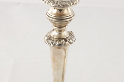 Lot 142 - A PAIR OF REGENCY SILVER CANDLESTICKS