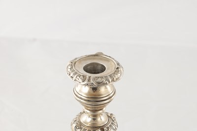Lot 142 - A PAIR OF REGENCY SILVER CANDLESTICKS